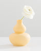 Yellow handmade porcelain vase with bubble design. 