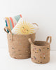 boho jute basket with colorful fabric accents