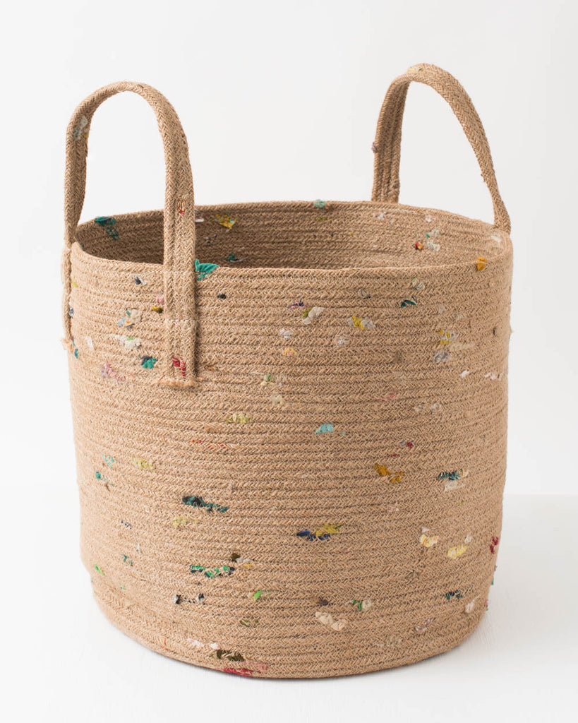 boho jute basket with colorful fabric accents