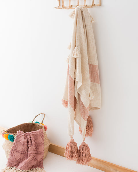 Pink throw with hotsell tassels