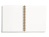 spiral bound lined notebook flat laying