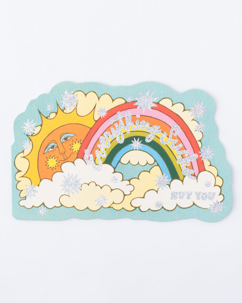 funny retro inspired card with glitter foil text 'everything sucks but you' with vintage sun and rainbow cloud motif