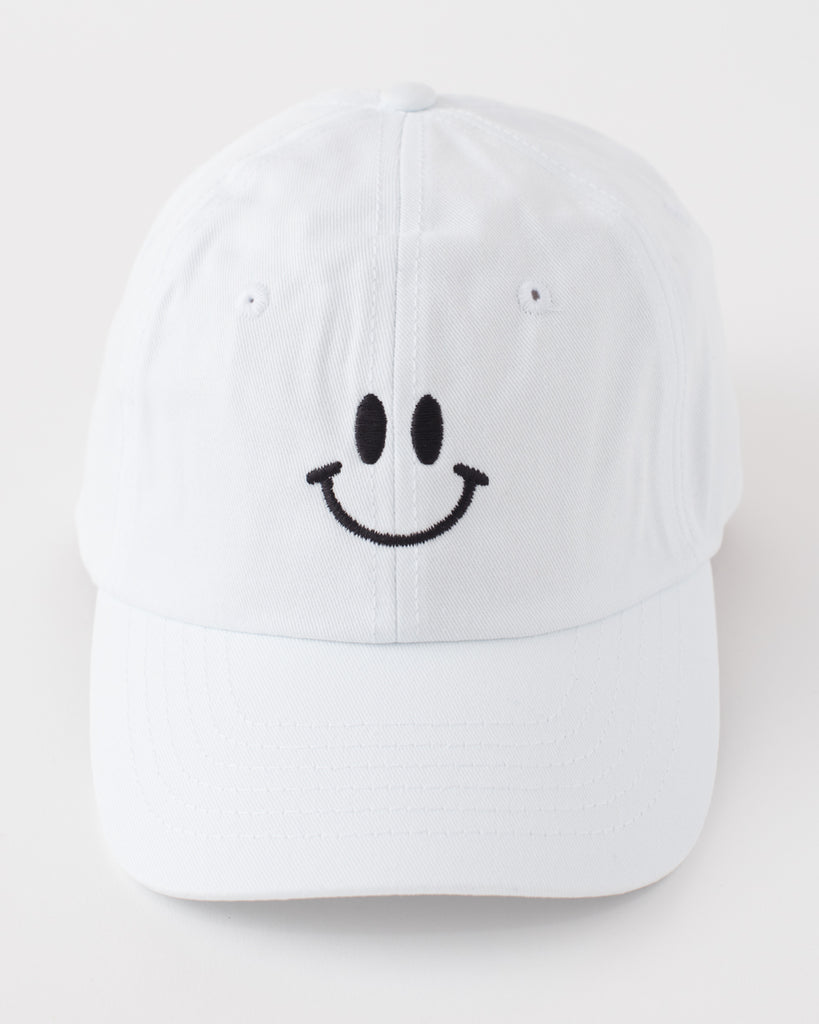white ballcap style hat with black embroidered smiley face