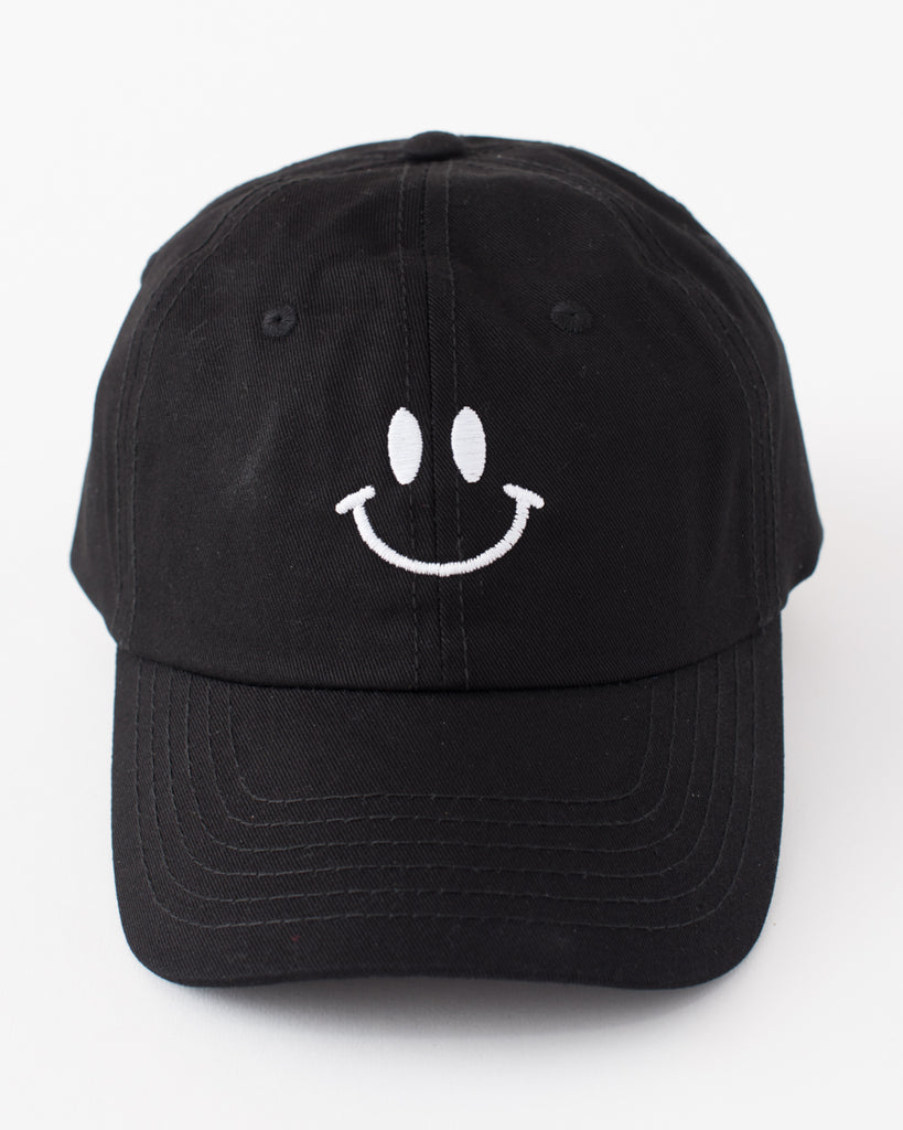 black baseball cap style hat with white embroidered smiley face