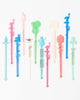 Vintage retro swizzle sticks drink stirrers in pastel colors. Designs from Las Vegas, Miami, and New York. Great for bar carts or tiki bars. 